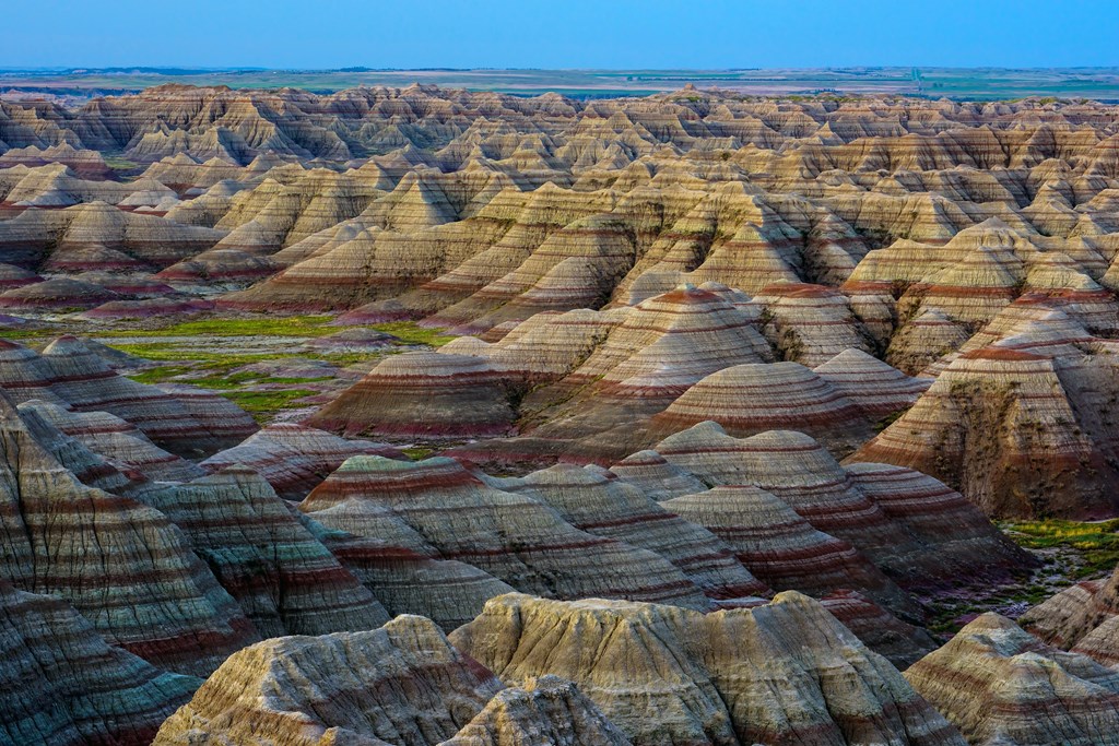 The hills of Badlands National Park just before sunrise.